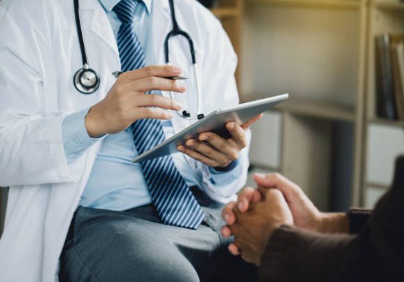 Psychiatrist or professional psychologist counseling or therapy session to male patients suffering from mental health problems. due to economic failure after the COVID-19 pandemic. PTSD Mental health.